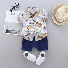 Laden Sie das Bild in den Galerie-Viewer, Dinosaur Print Short-sleeve Shirt and Solid Pants Set